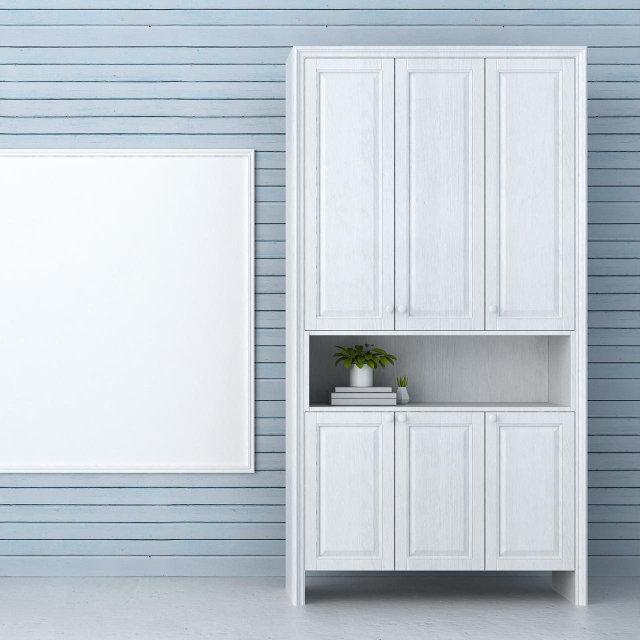 A blue painted wooden wall with a white cabinet and a board.